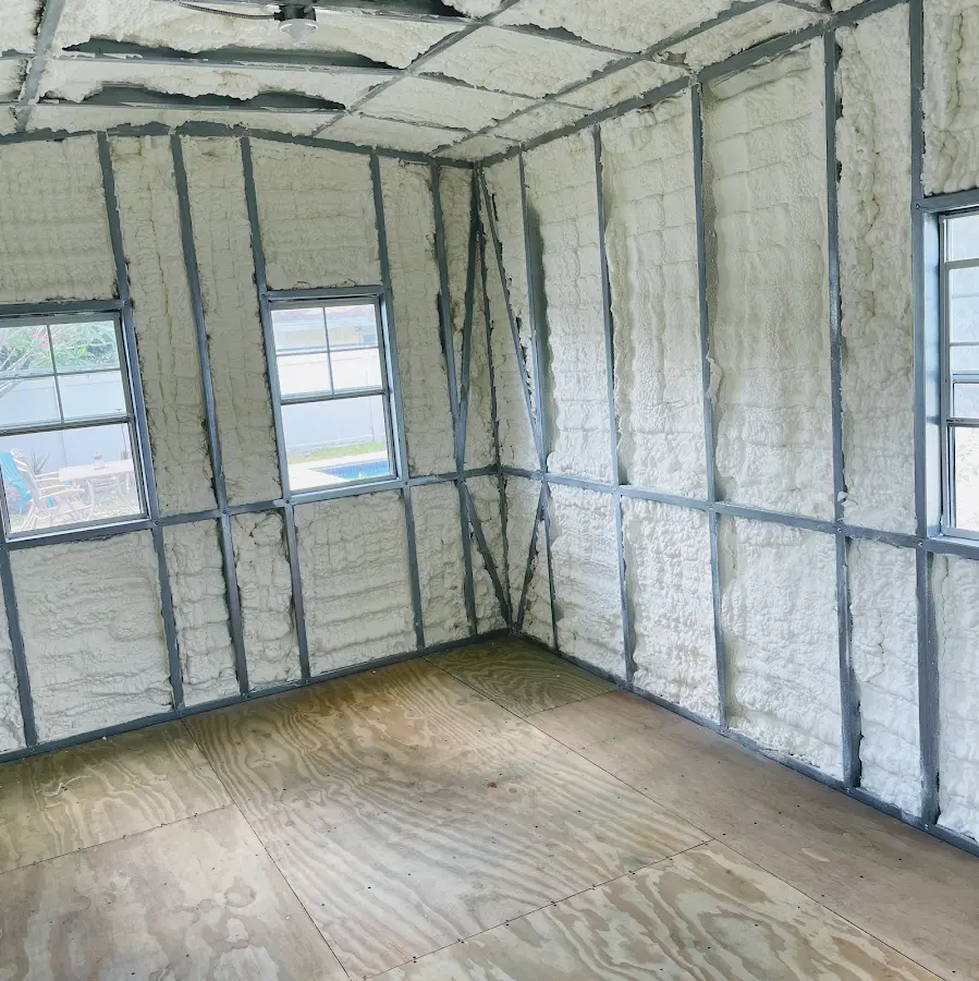 Closed-cell spray foam insulation applied to wall cavities in a residential project in Boone